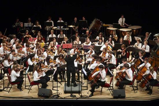 Photograph of Young Highland Musicians Shine On Stage